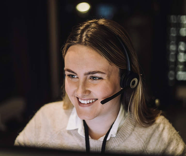 Woman in customer support, smiling, talking