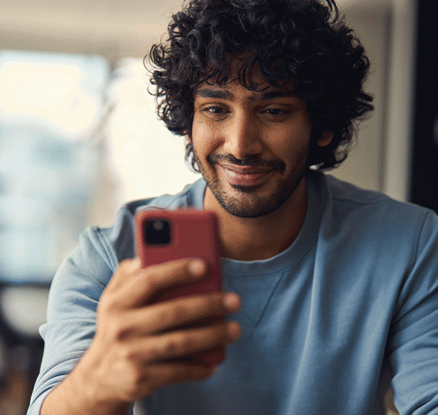 A man is checking his phone.