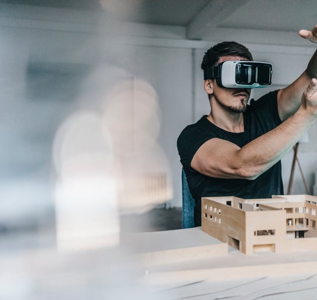 young man wearing VR glasses 