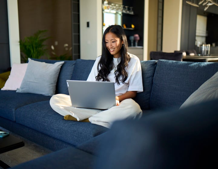 Woman reading on laptop