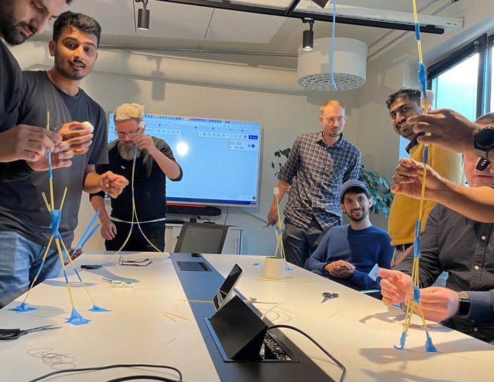 three employees who participated in the agile october kick off event