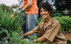 Smiling woman doing gardening