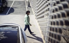 Man in free-flow parking lot