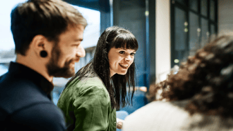 Man and Woman discussion with another woman