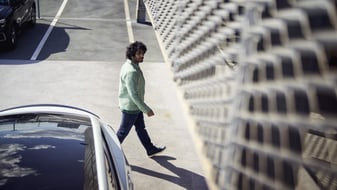 Man in free-flow parking lot