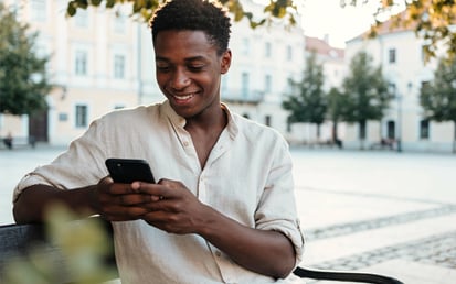 Person looking at their budget on a phone screen