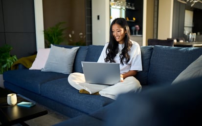 Woman reading on laptop