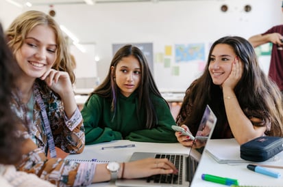three girls studying