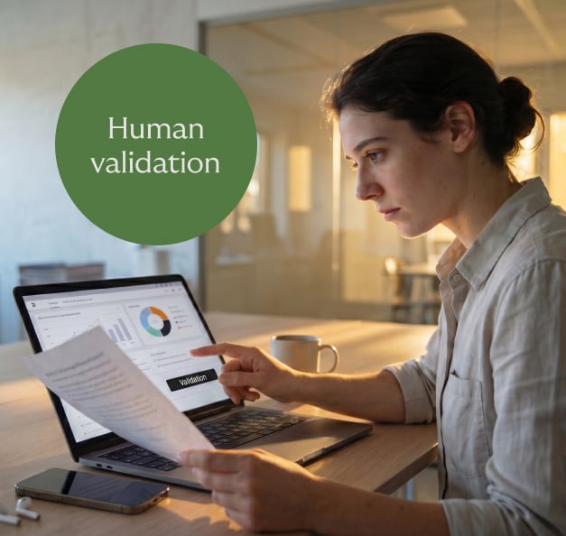 Woman checking data at laptop