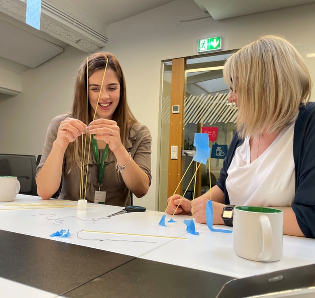 two employees in Tallinn office who participated in the workshop