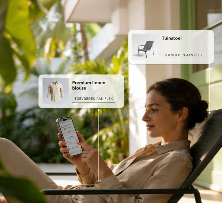 Woman using a smartphone while relaxing outdoors.
