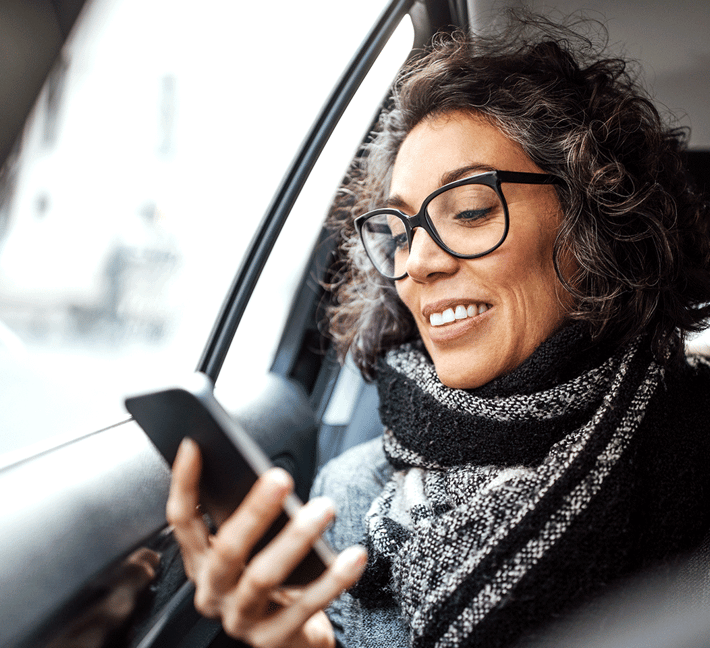 Woman looking on her mobile phone