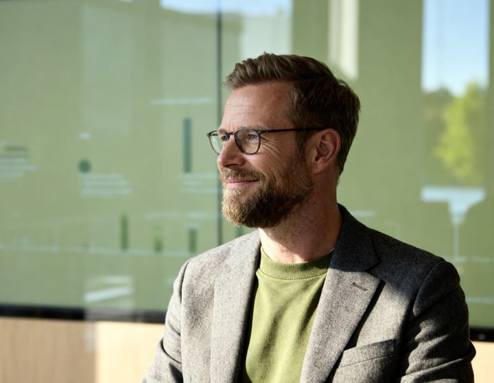 Man looking out the window