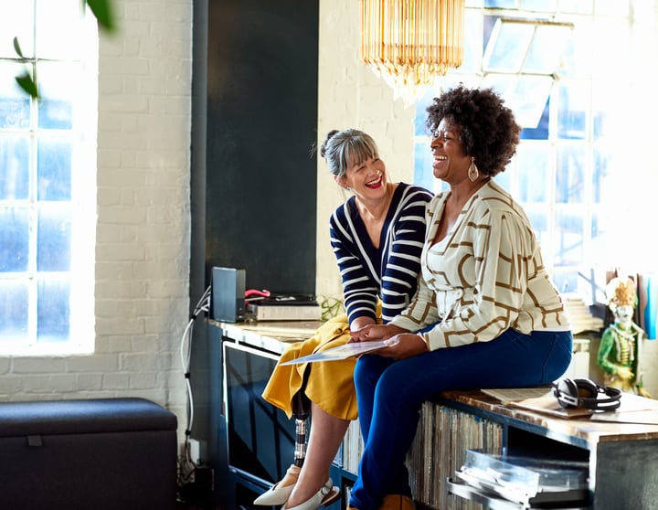 Two women laughing 