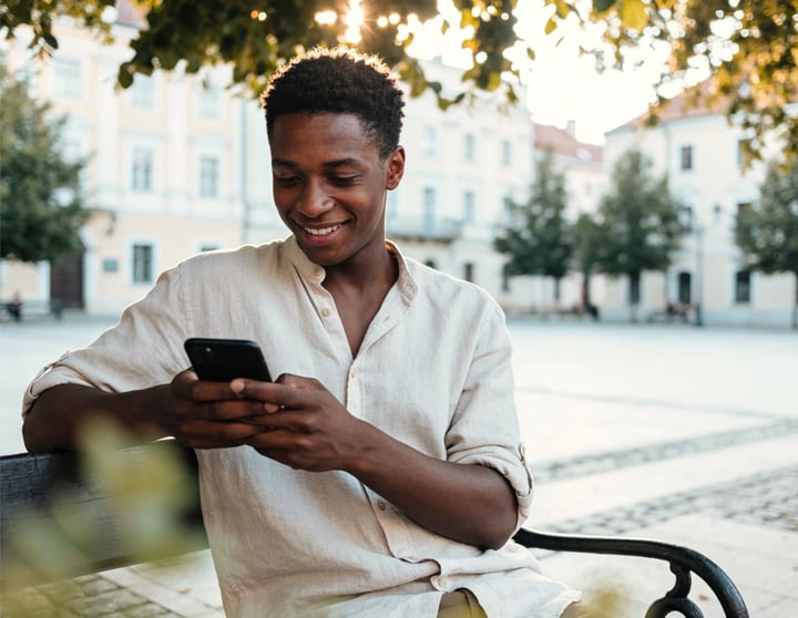 Person looking at their budget on a phone screen