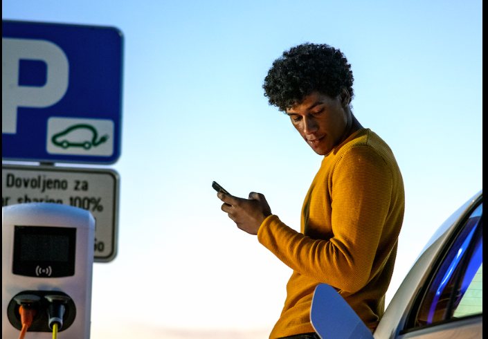 Man is charging his car