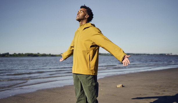 man next to the ocean