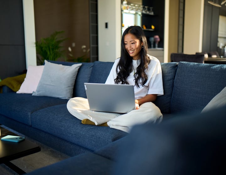 Woman reading on laptop