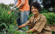 Smiling woman doing gardening