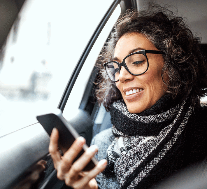 Woman looking on her mobile phone